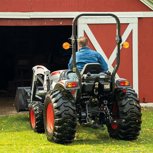 Bobcat Compact Tractor with Bucket Attachment